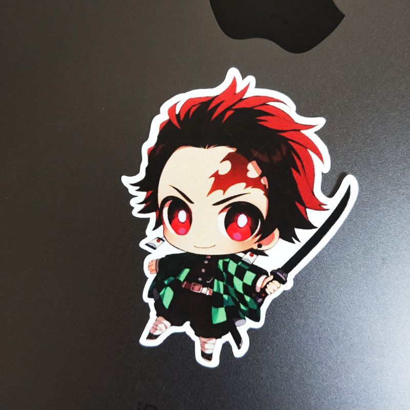 Fighting Tanjiro die-cut sticker