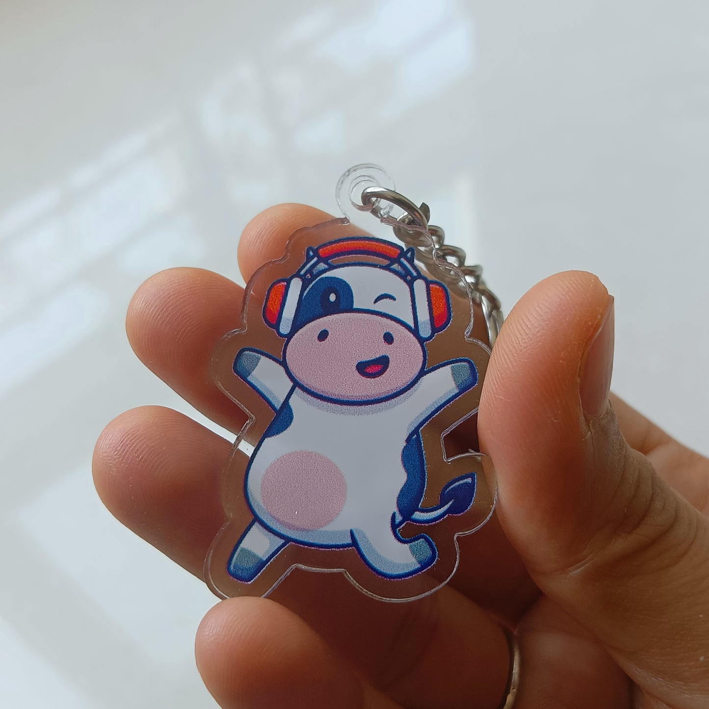 Musical Moo acrylic keychain