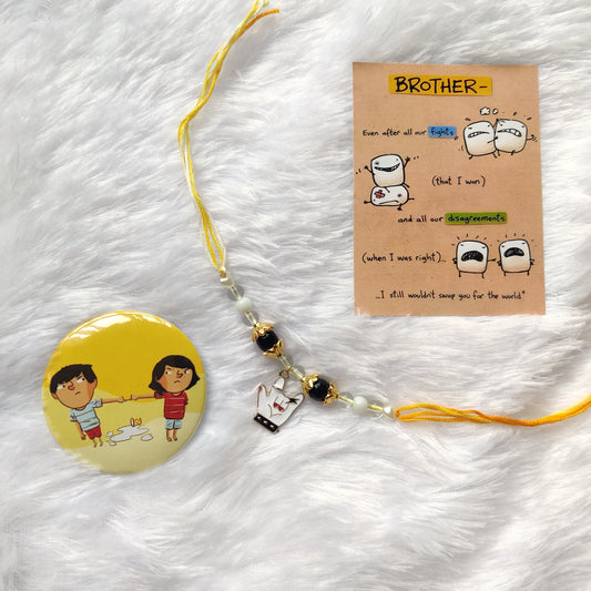 Handmade YOLO Hand Rakhi with Reusable Enamel Charm – Gift Set with Postcard, Badge & Ritual Essentials