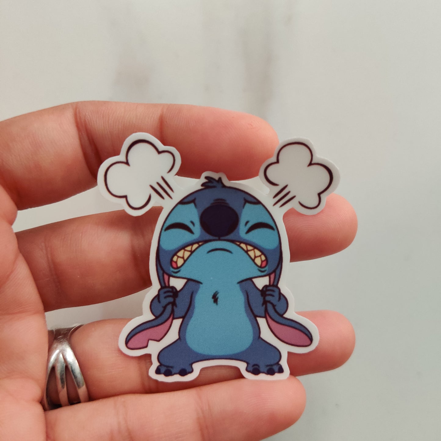 Frustrated Stitch die-cut sticker